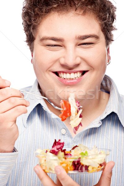 Pyzaty człowiek Sałatka szczęśliwy młodych jedzenie Zdjęcia stock © imarin