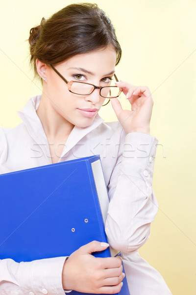 secretary with eyeglasses holding file Stock photo © imarin