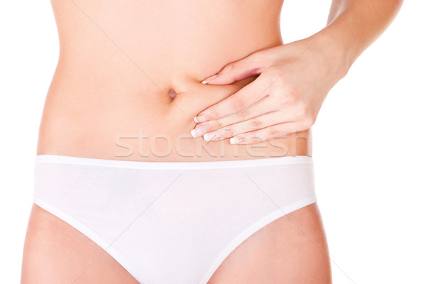 pinching stomach for skin fold test Stock photo © imarin