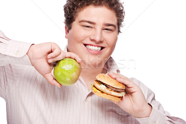 Chubby homme pomme hamburger jeunes [[stock_photo]] © imarin