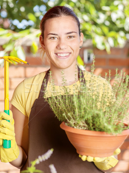 Plantes jeune femme jardin femme [[stock_photo]] © imarin