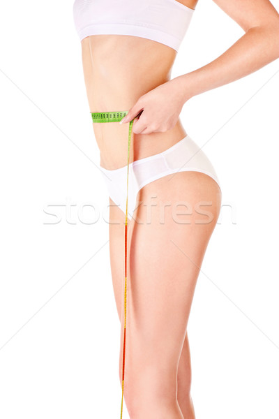 female body and measure tape Stock photo © imarin