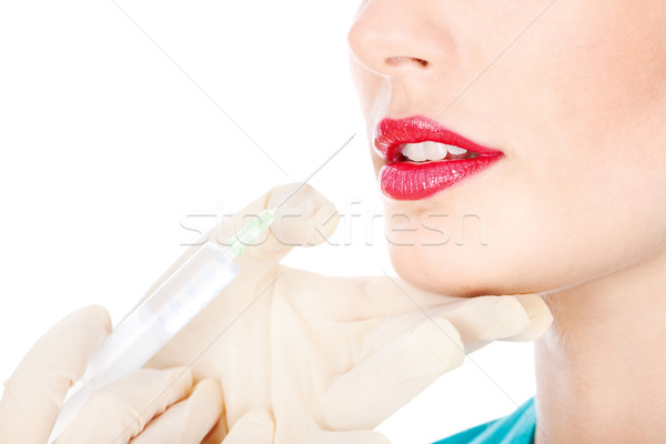 商業照片: 注射器 · 嘴唇 · 手 · 矽膠 · 孤立 · 白