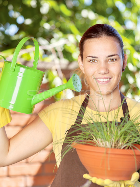 Plantes jeune femme jardin femme [[stock_photo]] © imarin