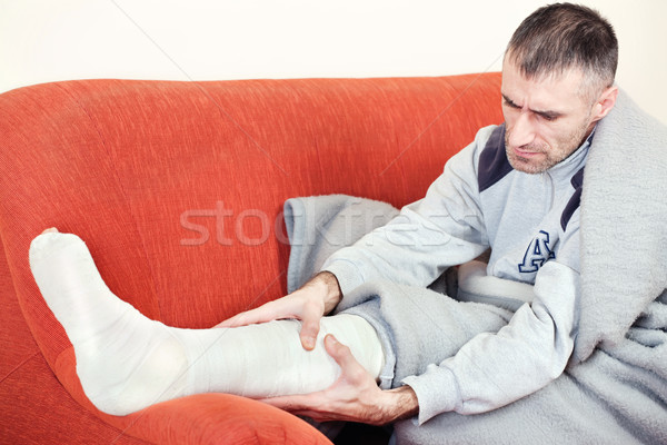 man with broken leg Stock photo © imarin