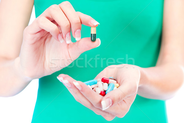 Capsules hand geïsoleerd witte vrouw gezondheid Stockfoto © imarin