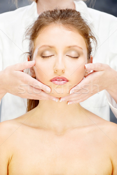 Femme tête massage jolie femme traitement visage [[stock_photo]] © imarin