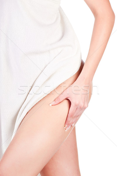 Woman pinching leg for skin fold test Stock photo © imarin