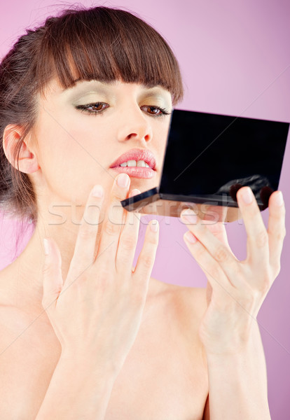 Femme visage peau miroir jolie femme regarder [[stock_photo]] © imarin