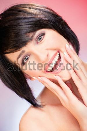 Femme joli rouge sourire oeil bleu [[stock_photo]] © imarin