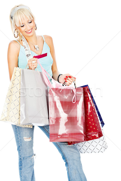 Bags and credit card in her hands Stock photo © imarin