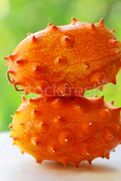 Pepene galben fruct doua fructe fundal portocaliu Imagine de stoc © inaquim