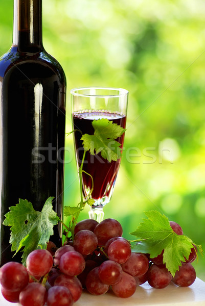 grapes with a bottle of wine and glass  Stock photo © inaquim