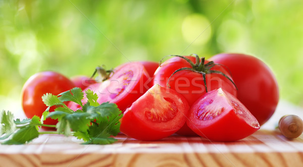 sliced tomatoes  and cilantro on table Stock photo © inaquim