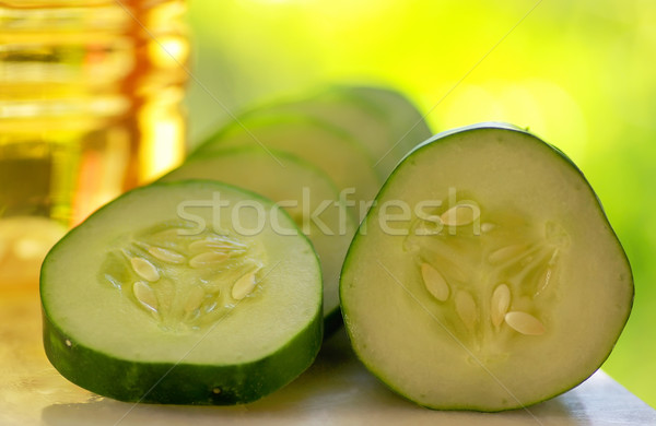 Cucumber slices and  vinegar. Stock photo © inaquim