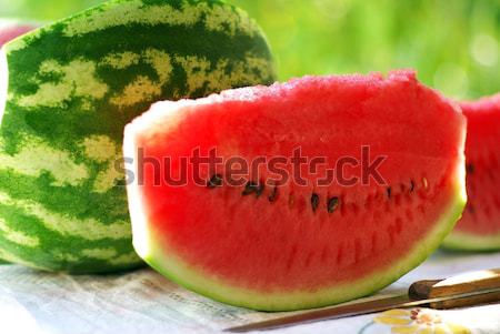 Szeletek piros görögdinnye textúra zöld szín Stock fotó © inaquim