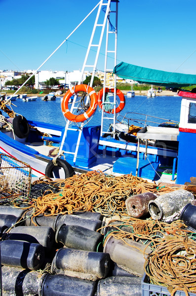 Boat and fishing equipments Stock photo © inaquim