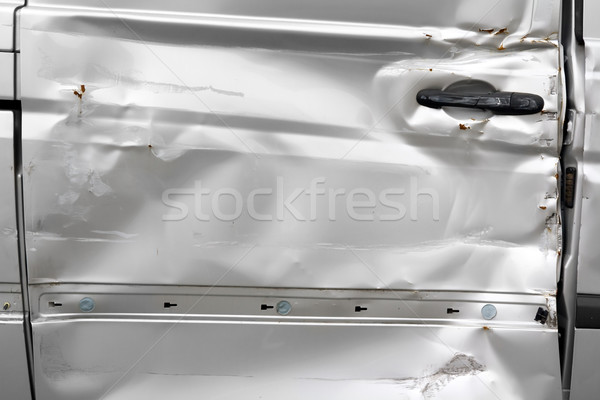 Beschadigd auto lichaam schade zilver deur Stockfoto © IngaNielsen