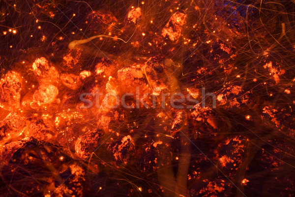 Glowing coals and sparks Stock photo © IngaNielsen