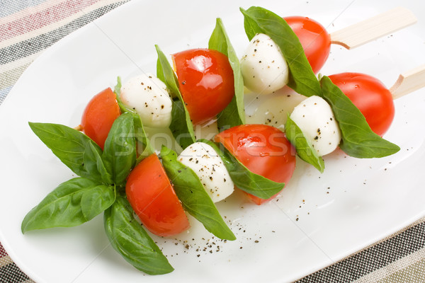 Mozzarella fesleğen kiraz domates kebap yeşil Stok fotoğraf © IngridsI