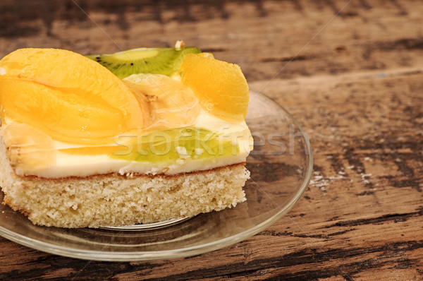 Close-up  of apricot cake on glass plate on wooden table Stock photo © inxti