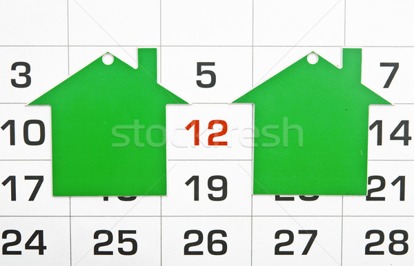 two shape green houses on a calendar background, paying your mor Stock photo © inxti