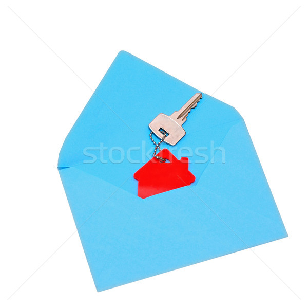 house symbol and key in open envelope  Stock photo © inxti