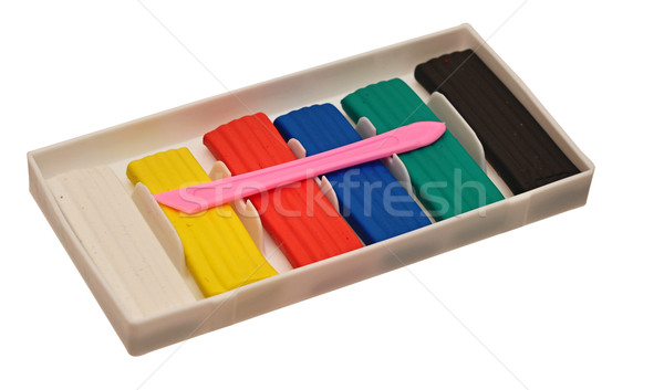 Color children's plasticine lies on a white background Stock photo © inxti