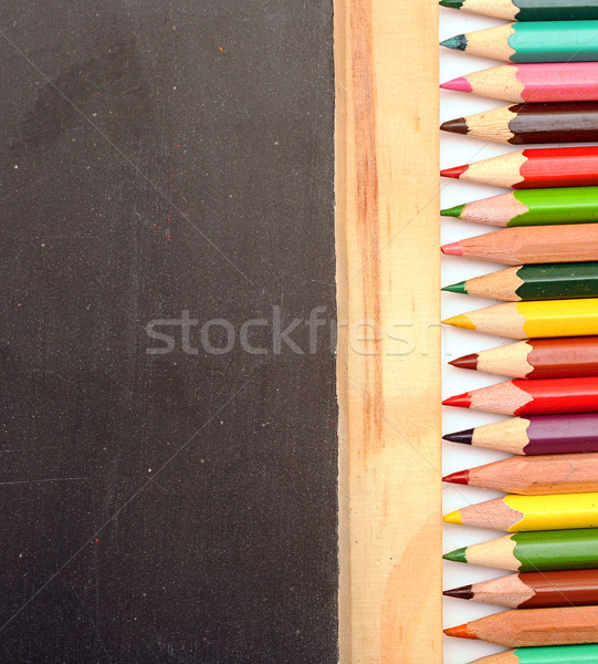 Colorful pencil on blank blackboard Stock photo © inxti