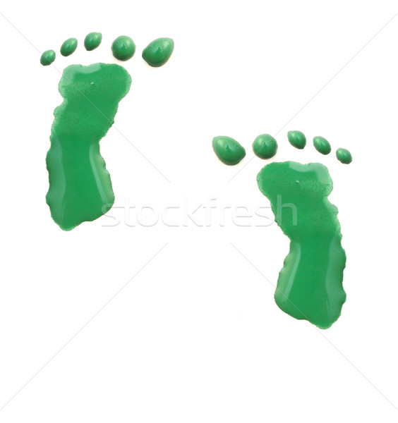 Stock photo: colorful kid foot painted isolated on white