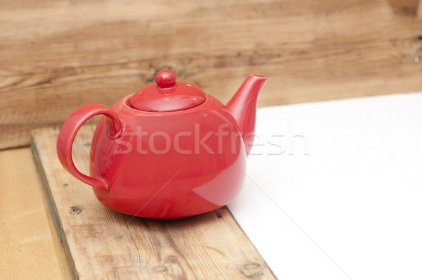 teapot on a wooden table and wood background, with space for tex Stock photo © inxti