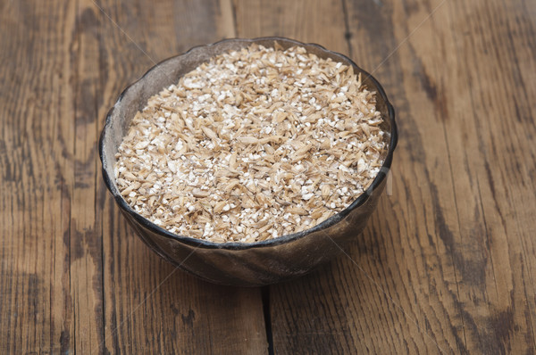 Pale malt barley in a glass bowl, an ingredient for beer.  Stock photo © inxti