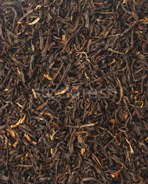 Handful of black tea leaves on white background  Stock photo © inxti