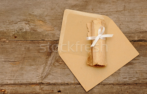 Rollen oud papier houten achtergrond brief retro Stockfoto © inxti