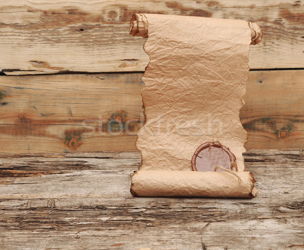 Ancient scroll with wax seal on wooden table Stock photo © inxti