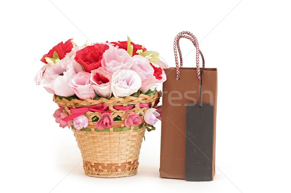 Paper flower in a basket with shopping bag Stock photo © inxti
