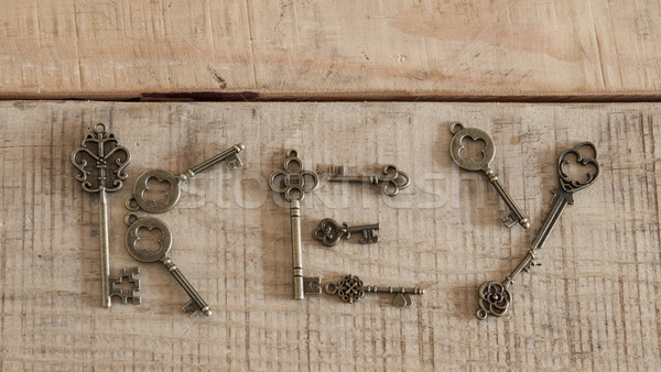 antique keys on vintage background Stock photo © inxti