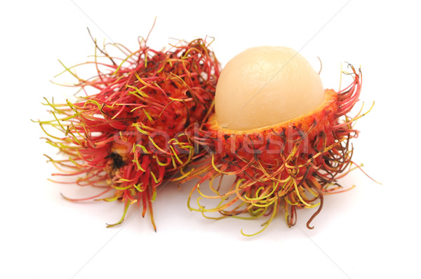 rambutan and one peel off rind Stock photo © inxti