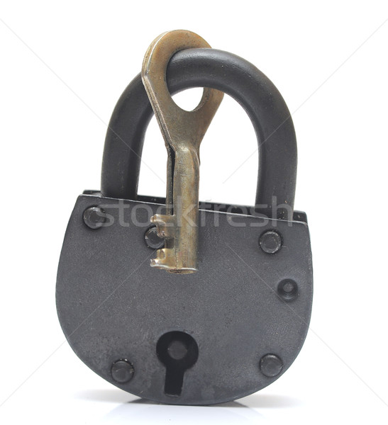 lock and key isolated on white  Stock photo © inxti