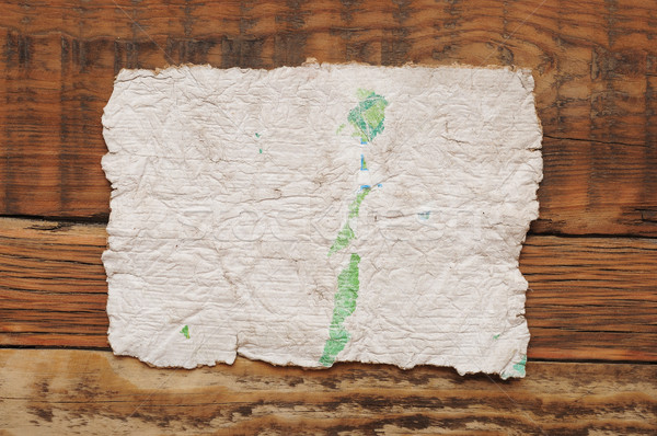 Stock photo: Old white paper sheet on wooden table 