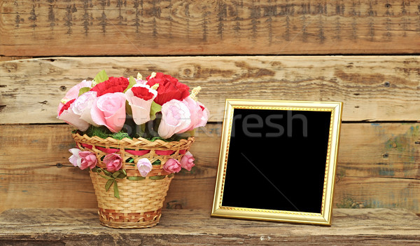 bouquet paper flower in a basket with blank photoframe Stock photo © inxti