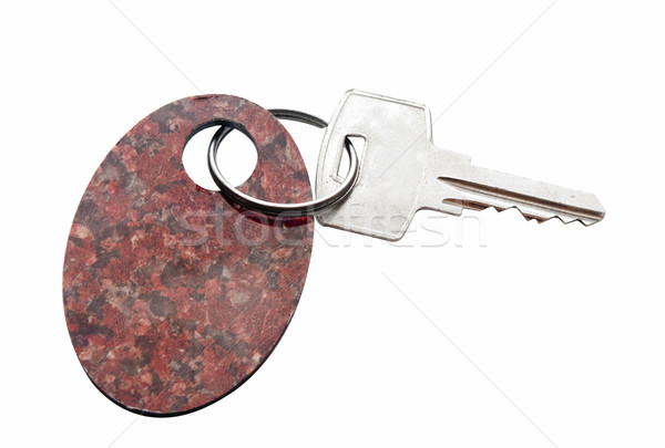 Stock photo: key with a tag on a white background 