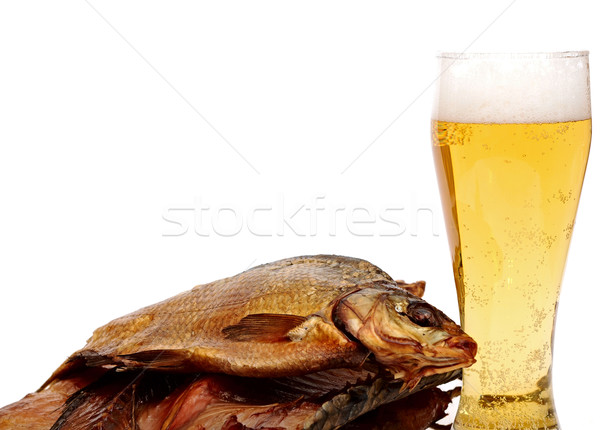 beer and smoked fish on a white background Stock photo © inxti