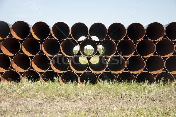closeup of a pile of large and rusting steel pipes Stock photo © inxti