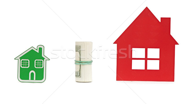 two small house and dollar bills. Business exchange with money a Stock photo © inxti