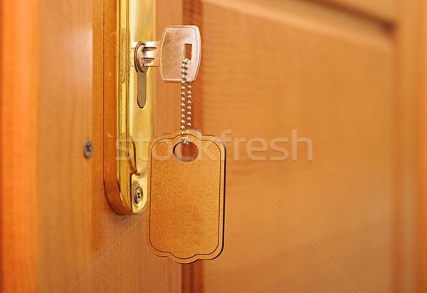 key in keyhole with blank label  Stock photo © inxti