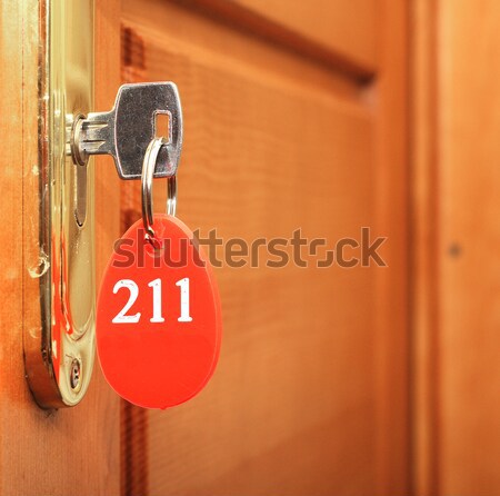Puerta madera clave ojo de la cerradura etiqueta oficina Foto stock © inxti