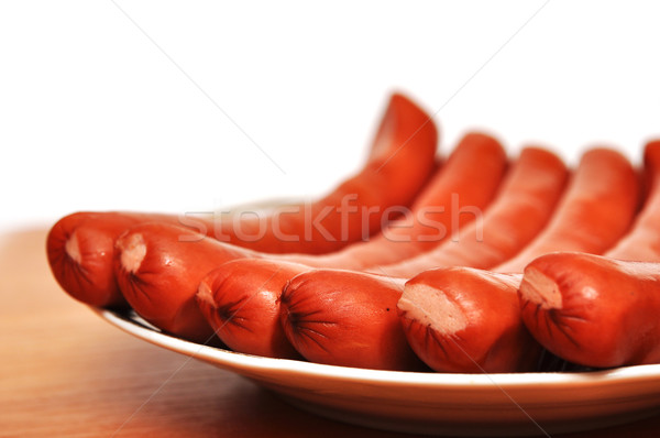 Primer plano placa salchichas mesa grupo carne Foto stock © inxti