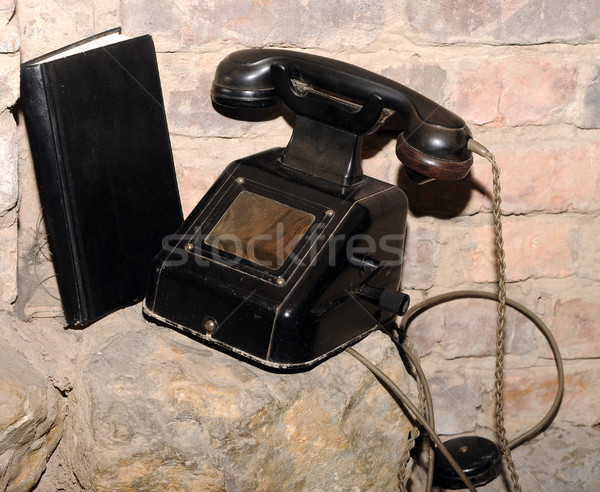 Vintage black telephone with note book Stock photo © inxti