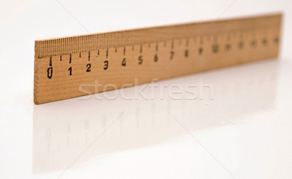 wooden ruler on a white background  Stock photo © inxti